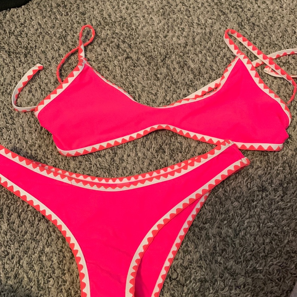 Bright pink swim suit